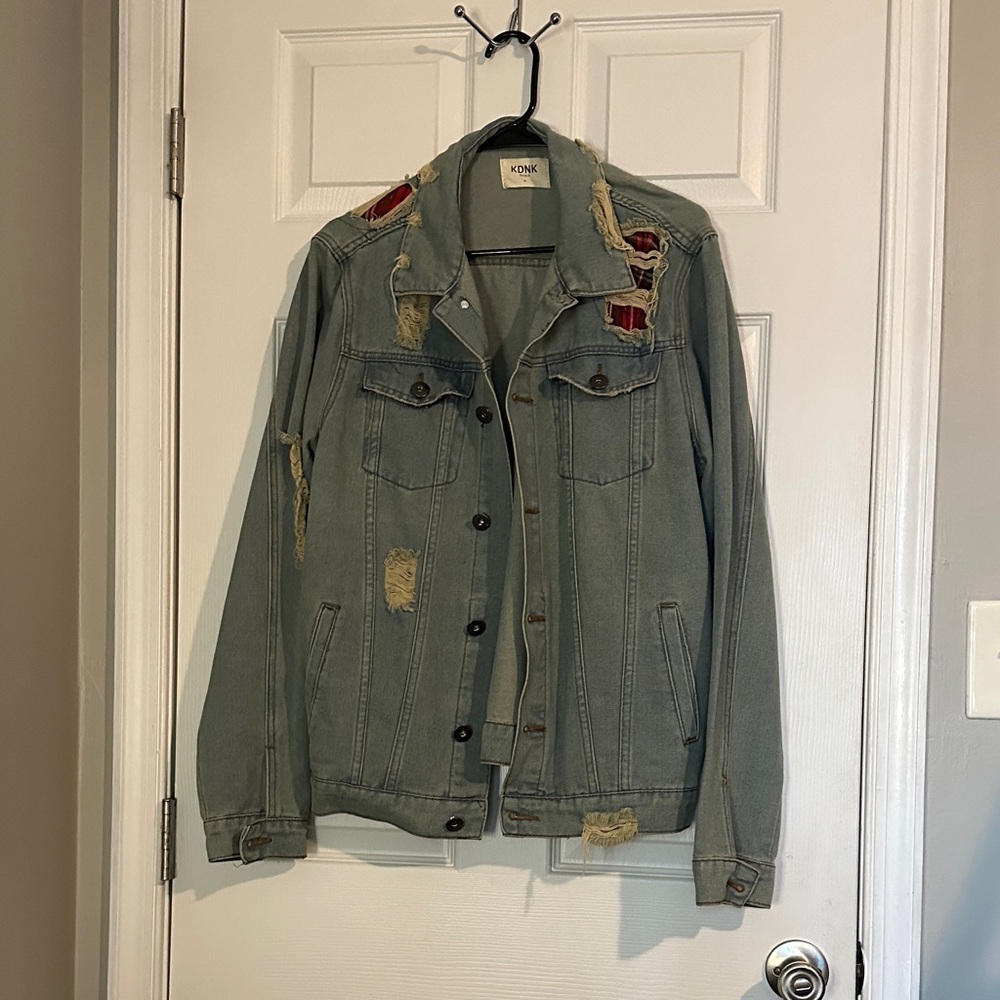 Distressed Denim Jacket with Patches
